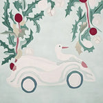 A charming area rug featuring a whimsical Christmas scene with a duck riding in a car surrounded by holly leaves and berries. This wool rug is perfect for adding a festive touch to any living room decor.