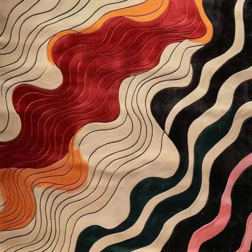 A vibrant, hand tufted area rug with an abstract wave pattern in rich hues of red, orange, black, and cream. This contemporary wool rug is ideal for adding a modern touch to any dining room or living room setting.