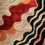 A vibrant, hand tufted area rug with an abstract wave pattern in rich hues of red, orange, black, and cream. This contemporary wool rug is ideal for adding a modern touch to any dining room or living room setting.