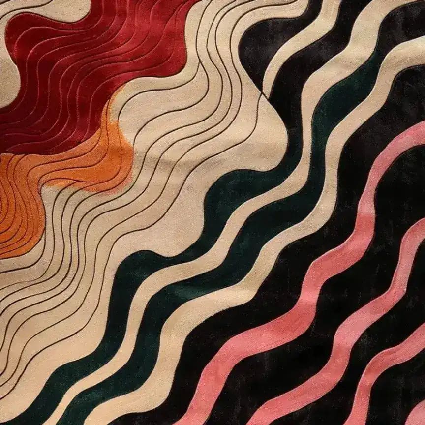 A close-up view of the Radiant Harmony Hand Tufted Area Rug showcasing its wavy abstract pattern in vibrant shades of red, orange, black, and cream. This contemporary wool rug is perfect for enhancing the aesthetic of dining rooms or living rooms, offering a modern and artistic touch.