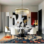 Stylish living room featuring a large area rug with a vibrant floral design. This hand-tufted wool rug adds a pop of color and elegance to the space, perfectly complementing the modern decor. Ideal for those seeking living room area rugs that are both functional and decorative.