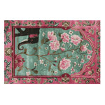 The Radiant Petals Hand Tufted Wool Rug features a vibrant design with pink floral patterns and intricate details on a teal background. Perfect for large living room areas, this Persian-style wool rug adds elegance and warmth to any space, making it an ideal choice for rugs for living room settings.