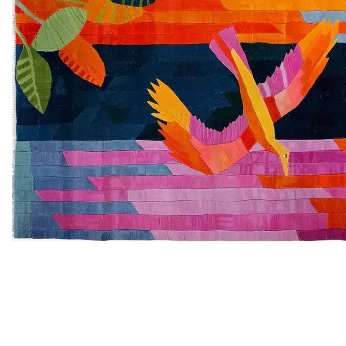 A vibrant area rug featuring an abstract design with colorful geometric patterns and a radiant bird motif. Perfect for adding a bold touch to living room spaces, this hand tufted wool rug offers a lively mix of pink, orange, and blue hues. Ideal as a large living room rug, especially in the 8x10 size, it brings a unique artistic flair to any home decor.
