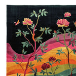 Vibrant hand tufted area rug featuring a floral design with colorful blossoms and leaves against a dark background, perfect for adding a touch of elegance to a living room. This wool rug showcases a stunning palette of oranges, pinks, and greens, making it an ideal choice for those seeking unique and stylish area rugs for living room decor.