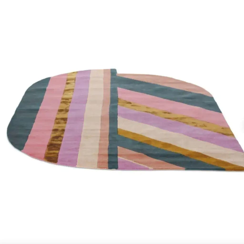 A vibrant Rainbow Geometry Retro Hand Tufted Wool Rug, ideal as an area rug for living room or bedroom. The rug features bold geometric patterns in shades of pink, blue, and gold, perfect for vintage and contemporary spaces alike. Measuring 8x10, this wool rug adds a splash of color and style to any living room or bedroom setting.