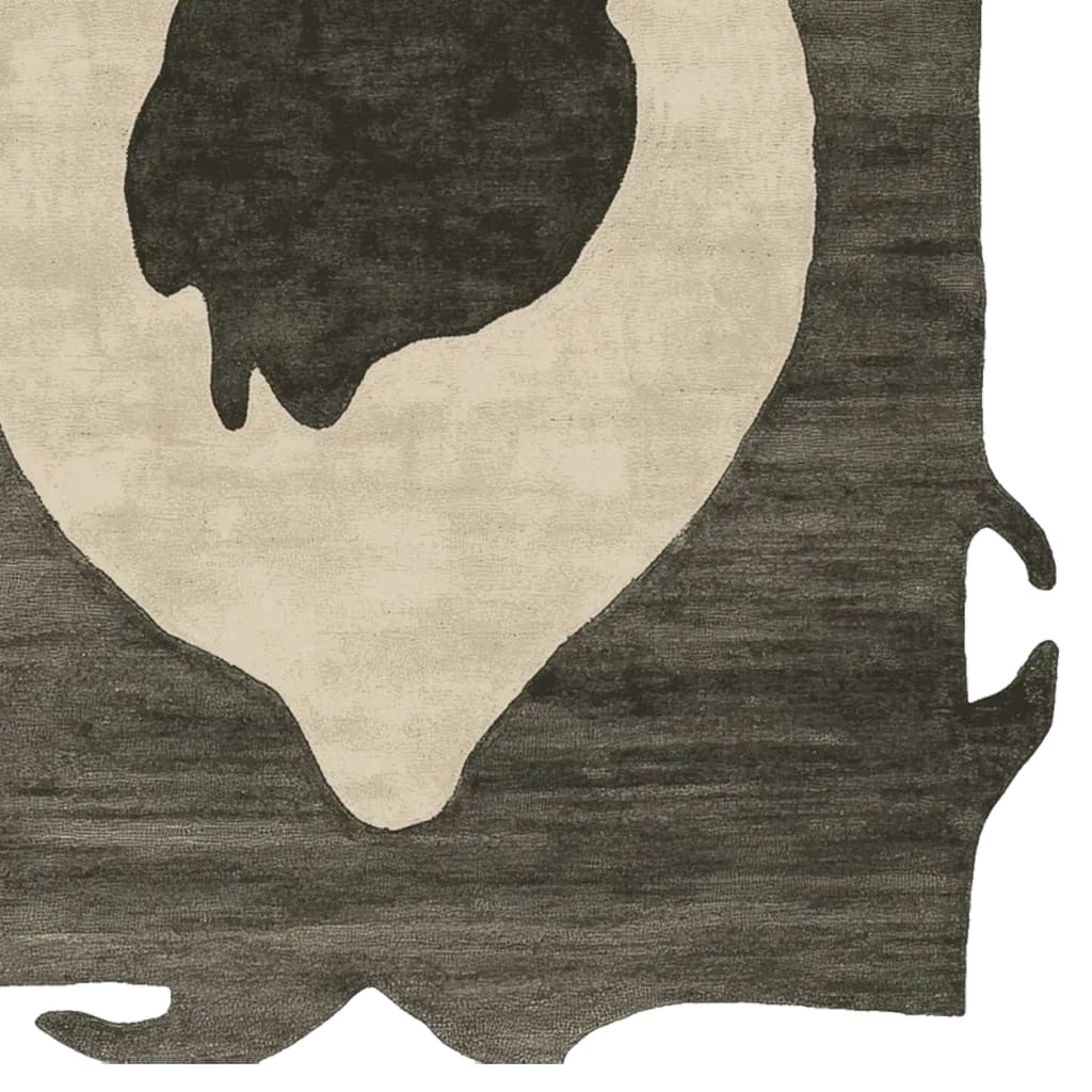 A contemporary wool rug with an abstract design, featuring raw edges and a totem-like pattern. This area rug, perfect for modern living rooms, showcases a blend of dark and light shades, creating a striking visual contrast.