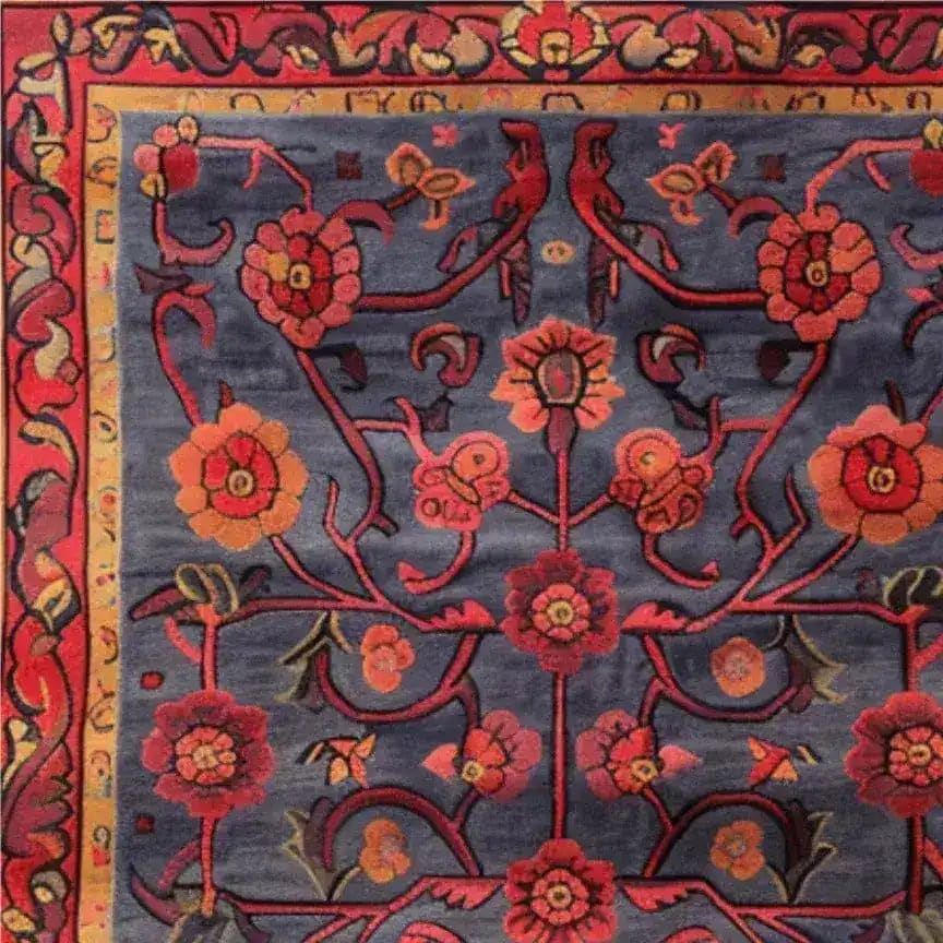 A beautifully designed Red Bloom Harmony area rug, perfect for dining rooms or living rooms. This hand-tufted wool rug features a striking floral pattern with vintage appeal, ideal for adding charm to any space. The intricate red and orange flowers on a deep blue background make it a standout choice for dining room area rugs or as an 8x10 living room rug.