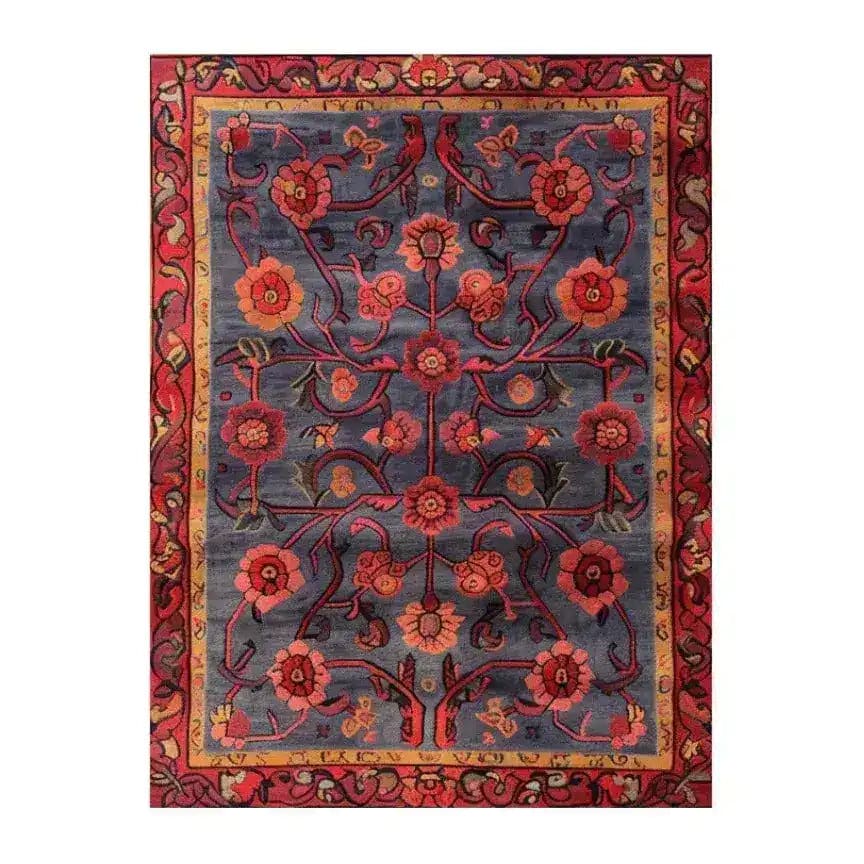 The Red Bloom Harmony Rug is an elegant hand-tufted area rug, perfect for adding a touch of vintage charm to your dining room or living room. Featuring a rich floral pattern with vibrant red and orange blooms on a deep blue background, this 8x10 wool rug brings warmth and style to any space.