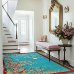 Elegant Red Bordered Spring Floral in the Blue Sky Wool Hand Knotted Area Rug placed in a stylish living room. The vibrant design and luxurious texture make it an ideal choice for rugs for living room settings, adding a touch of sophistication to large living room rugs decor.