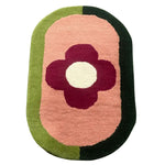 This vibrant Red Flower Hand Tufted Wool Rug is an exquisite area rug perfect for dining rooms and bedrooms. Featuring a unique floral design with bold colors, this wool rug adds a touch of elegance and warmth to any space, making it an ideal choice for dining room carpets or rugs for the bedroom.