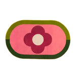 A vibrant red flower hand-tufted wool area rug featuring a bold floral design, perfect for adding a pop of color to dining rooms or bedrooms. This eye-catching rug serves as an elegant dining room carpet or a cozy wool rug for the bedroom.