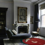 Elegant living room featuring a Red Flying Japanese Cranes Hand Tufted Rug. This area rug, perfect for living rooms or office spaces, showcases a striking design with graceful cranes on a vibrant red background. The rug complements the sophisticated decor, including a classic chaise lounge and a vintage fireplace, enhancing the room's aesthetic as a wool rug. Ideal as a living room rug 8x10 or a stylish round rug for an office setting.