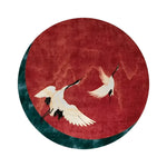 Round area rug featuring an elegant design of red flying Japanese cranes, perfect for adding a touch of sophistication to living rooms or offices. This wool rug, measuring 8x10, embodies a unique blend of art and functionality, making it an ideal choice for those seeking stylish living room rugs or versatile office decor.