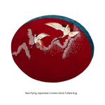 A stunning red round area rug featuring elegant Japanese cranes in flight, making it a perfect addition to living rooms or offices. This hand-tufted wool rug adds a touch of sophistication and is ideal for those seeking unique living room rugs 8x10 or stylish rugs for office spaces.