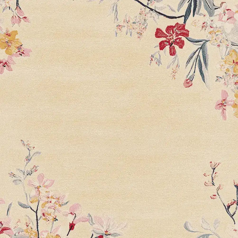 Elegant Red Frame Garden Hand Tufted Area Rug showcasing a delicate floral design. This wool rug is perfect for adding a touch of nature-inspired beauty to your living room. Ideal for those seeking stylish living room area rugs that combine comfort and aesthetics.