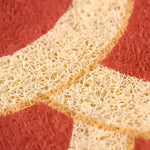 Close-up view of the Red Oriental Fish Door Mat showcasing its intricate texture and vibrant colors, perfect for adding a touch of elegance to living room area rugs. Ideal for those seeking unique living room rugs 8x10, this area rug combines style with function.