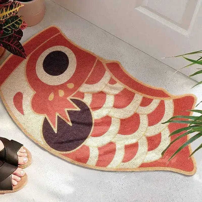 A vibrant red oriental fish-shaped area rug placed at the entrance of a living room, showcasing its bold design. Perfect for those seeking unique living room area rugs. This rug adds an artistic flair, ideal for spaces needing an 8x10 floor covering.