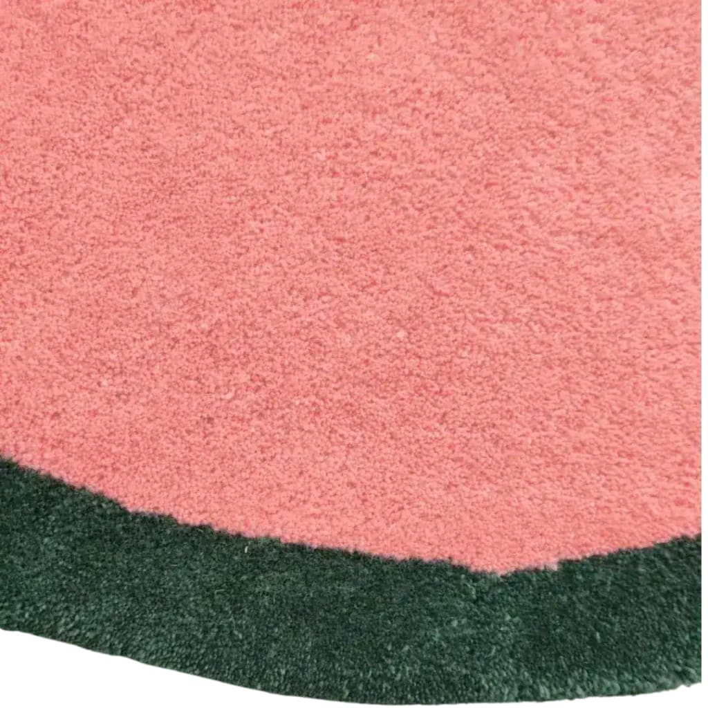 Close-up view of the Red Twin Flowers Hand Tufted Wool Rug, showcasing its vibrant pink and green colors. This contemporary area rug is perfect for large living room spaces, dining rooms, or as an 8x10 wool rug centerpiece in your stylish living room.