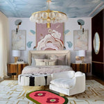 Stylish contemporary bedroom featuring a Red Twin Flowers Hand Tufted Wool Rug. The area rug adds a touch of elegance to the large living room setup, complementing the modern decor with its vibrant floral design. Ideal for dining or living rooms, this 8x10 wool rug enhances the luxurious ambiance.