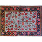 The Red Velvet Bloom Hand Knotted Area Rug showcases an intricate floral design with vibrant red and pink blooms set against a muted background, ideal for adding a touch of elegance to any living room. This 8x10 vintage rug embodies a classic Persian style, perfect for those seeking a stylish floral or living room area rug.