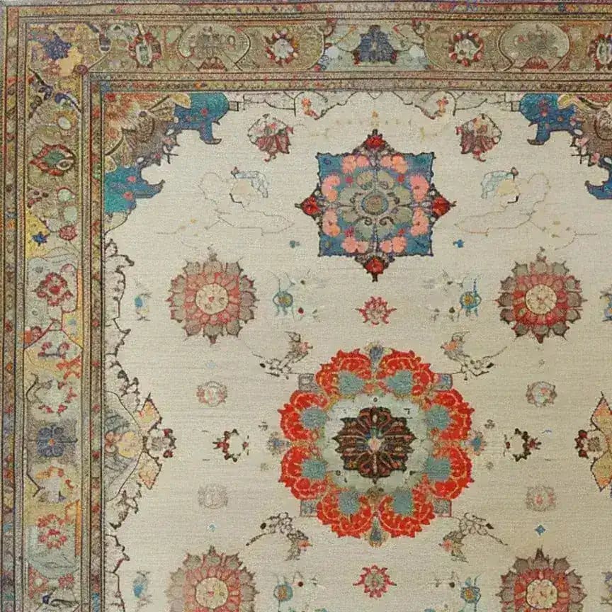 A close-up view of the Regal Blossom Medallion Hand Knotted Area Rug, showcasing its intricate vintage design with floral medallions in vibrant hues. Perfect for adding a touch of elegance to large living rooms, this Persian-inspired rug exemplifies timeless beauty and craftsmanship.