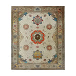Regal Blossom Medallion hand knotted rug, cream field with scattered floral medallions in red pink teal, taupe border