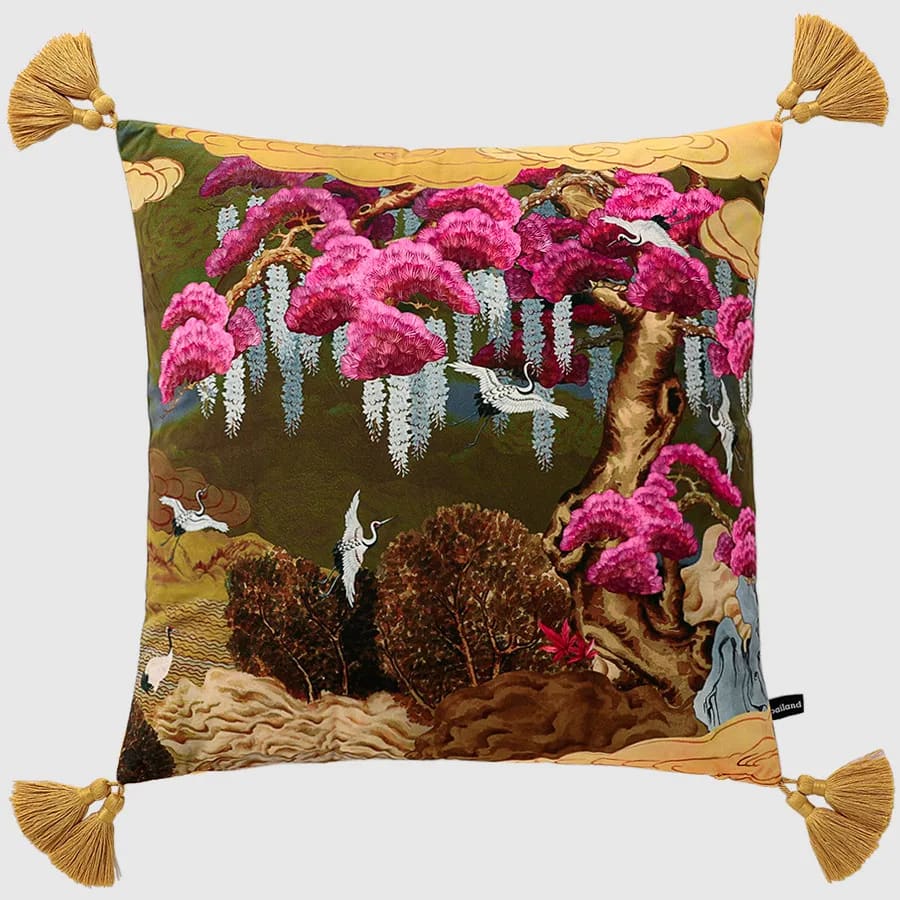 Regal Cranes and Wisteria themed throw pillow with vibrant pink floral design and golden tassels, perfect for home decor.