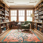 Library with bookshelves, armchair, and floral rug