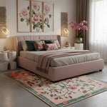 Regal floral frame hand tufted rug in a blush bedroom, pink floral vines on cream with green coral border
