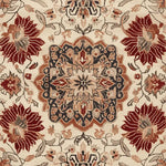 A detailed view of the Regal Petal Hand-Tufted Area Rug, showcasing intricate floral patterns in deep red, beige, and navy. This wool rug, perfect for large living rooms, adds a vintage charm with its elegant design.