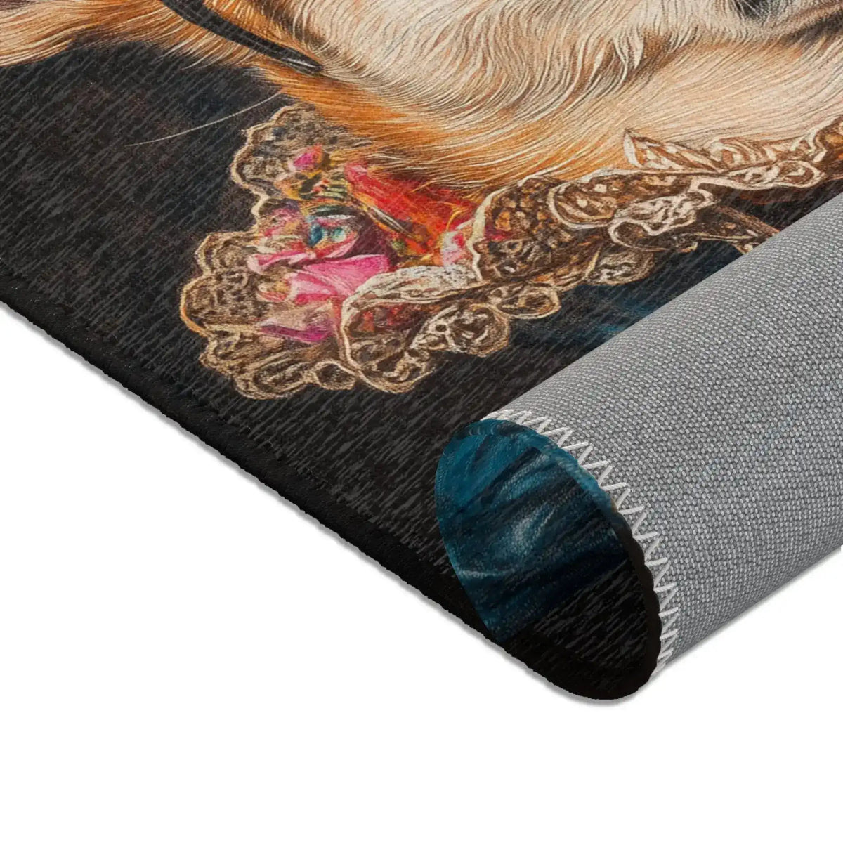 Close-up rolled corner of the Regal Renaissance Chihuahua rug showing gold lace ruff collar with pink center on dark charcoal and grey non-slip backing