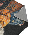 Corner fold of Regal Renaissance Pup Couture Dog Art Accent Rug showing orange brocade and blue jacket print with grey non-slip backing seam