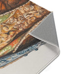 Close-up folded corner of Regal Reptile Renaissance Rug with gold scrollwork ornate coat detail and gray backing