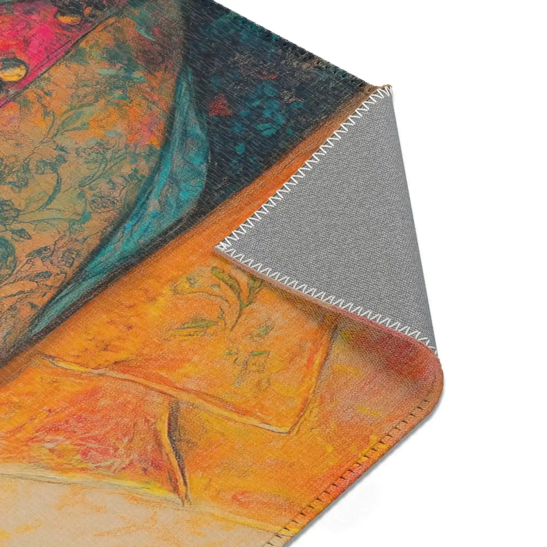 Regal Stag in Couture Accent Rug corner detail 2 — pink orange teal chest art with grey backing exposed at fold