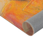 Regal Stag in Couture Accent Rug corner detail 6 — lower orange jacket section against grey non-slip backing