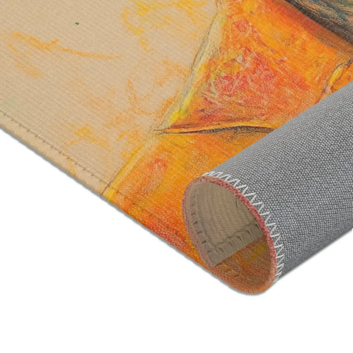Regal Stag in Couture Accent Rug corner detail — grey non-slip backing, white stitching, orange art fabric rolled at edge