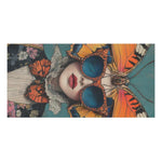 Horizontal detail of Renaissance Butterfly towel — orange wings flanking face with blue round sunglasses and lace collar against teal