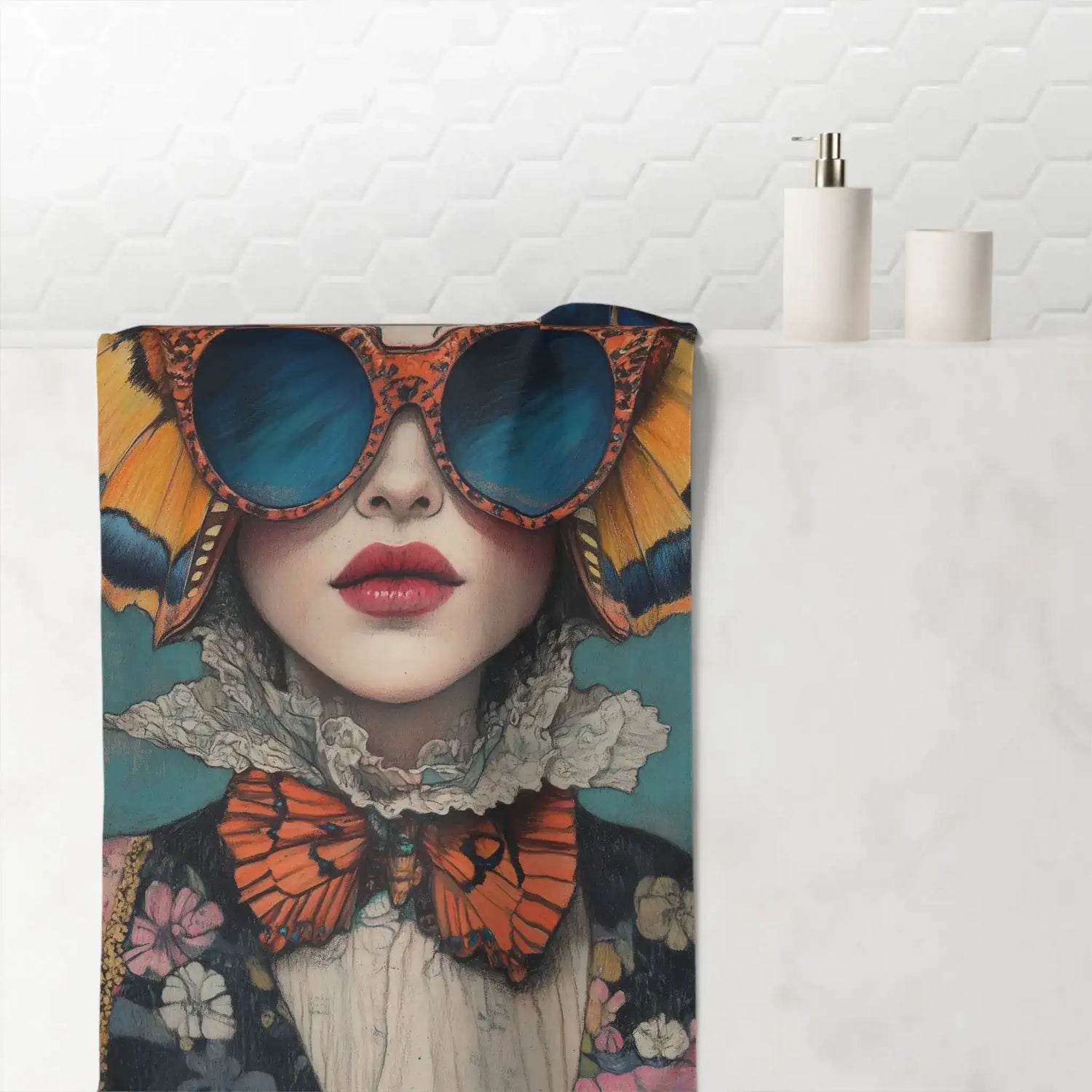 Renaissance Butterfly in Couture bath towel draped over bathtub in white bathroom, bold orange wings and blue sunglasses print