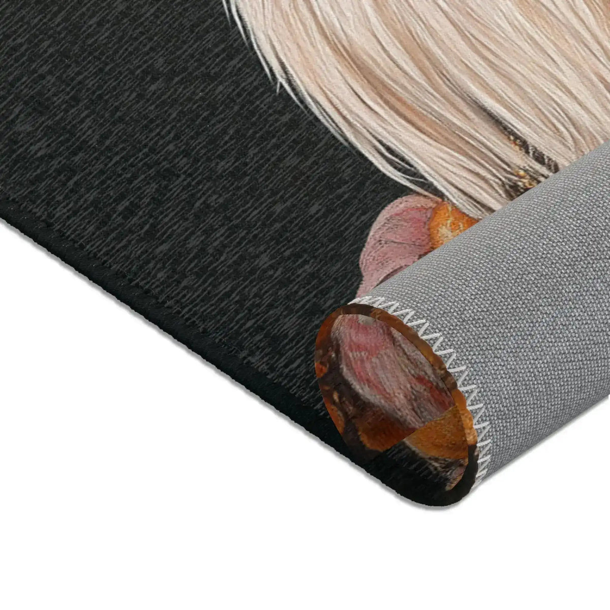 Flat white canvas surface with small metal corner fittings, plain backing view of Renaissance Rooster Couture Rug canvas back