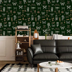 Retro botanical insect lattice wallpaper above white wainscot with black leather sofa and ladder shelf