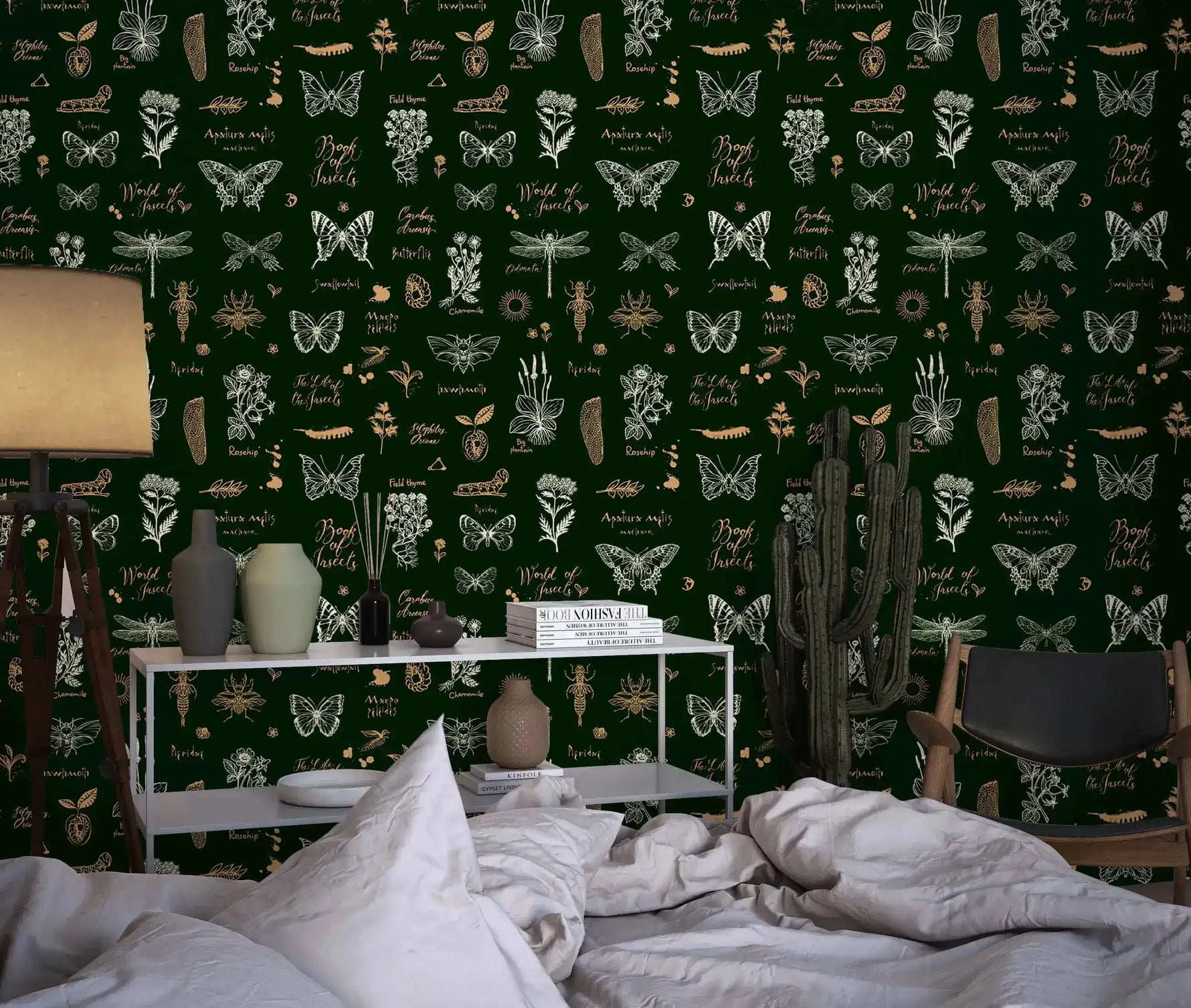 Vintage insect lattice wallpaper vignette, gold and cream moths and flora framing a wood side table