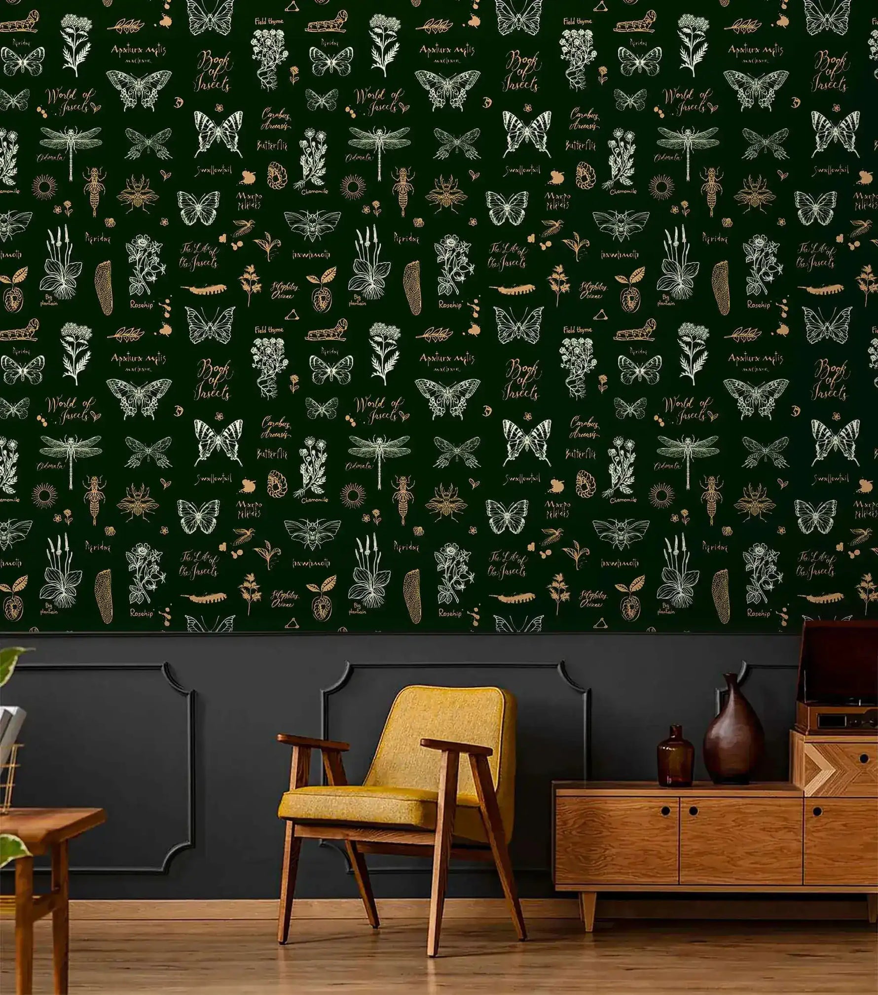 Retro botanical insect lattice wallpaper over dark wainscot with yellow chair and walnut sideboard