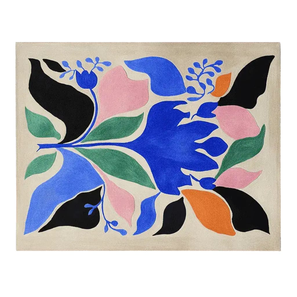 The Retro Dream Bloom Hand Tufted Rug is an area rug that showcases a bold, abstract floral pattern in vibrant colors including blue, pink, green, and orange against a neutral backdrop. This contemporary wool rug is perfect for adding a pop of color to living rooms, making it an ideal choice for area rugs for living room settings.
