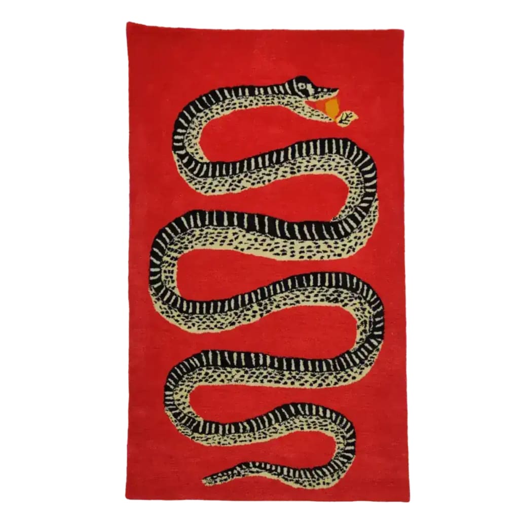 A striking Retro Red Snake Hand Tufted Wool Rug featuring a bold snake design on a vibrant red background. This eye-catching area rug is perfect for adding a vintage touch to a large living room or formal dining room, enhancing the space with its unique style and high-quality wool texture.