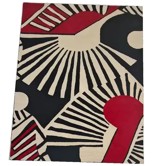 Rhythmic Rays Hand Tufted Rug featuring a bold, abstract design with striking red, black, and cream sunburst patterns, perfect for enhancing the aesthetics of living room and dining room spaces. This wool rug offers a modern flair, ideal as an area rug to complement any interior decor.