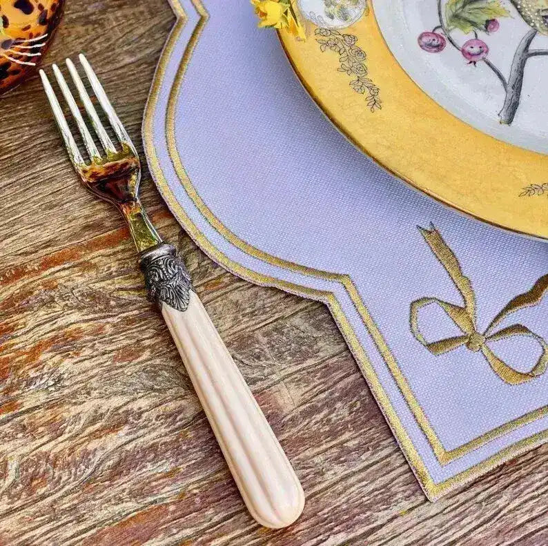 ribboned radiance placemat corner detail lavender gold bow ribbon embroidery yellow botanical plate antler fork rustic wood