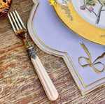 ribboned radiance placemat corner detail lavender gold bow ribbon embroidery yellow botanical plate antler fork rustic wood