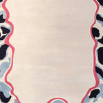 Top view of the Ripple Memory Frame Hand Tufted Rug, a contemporary area rug featuring an abstract wave-like border in shades of black, grey, and red. This wool rug is perfect for adding a modern touch to large living room spaces.