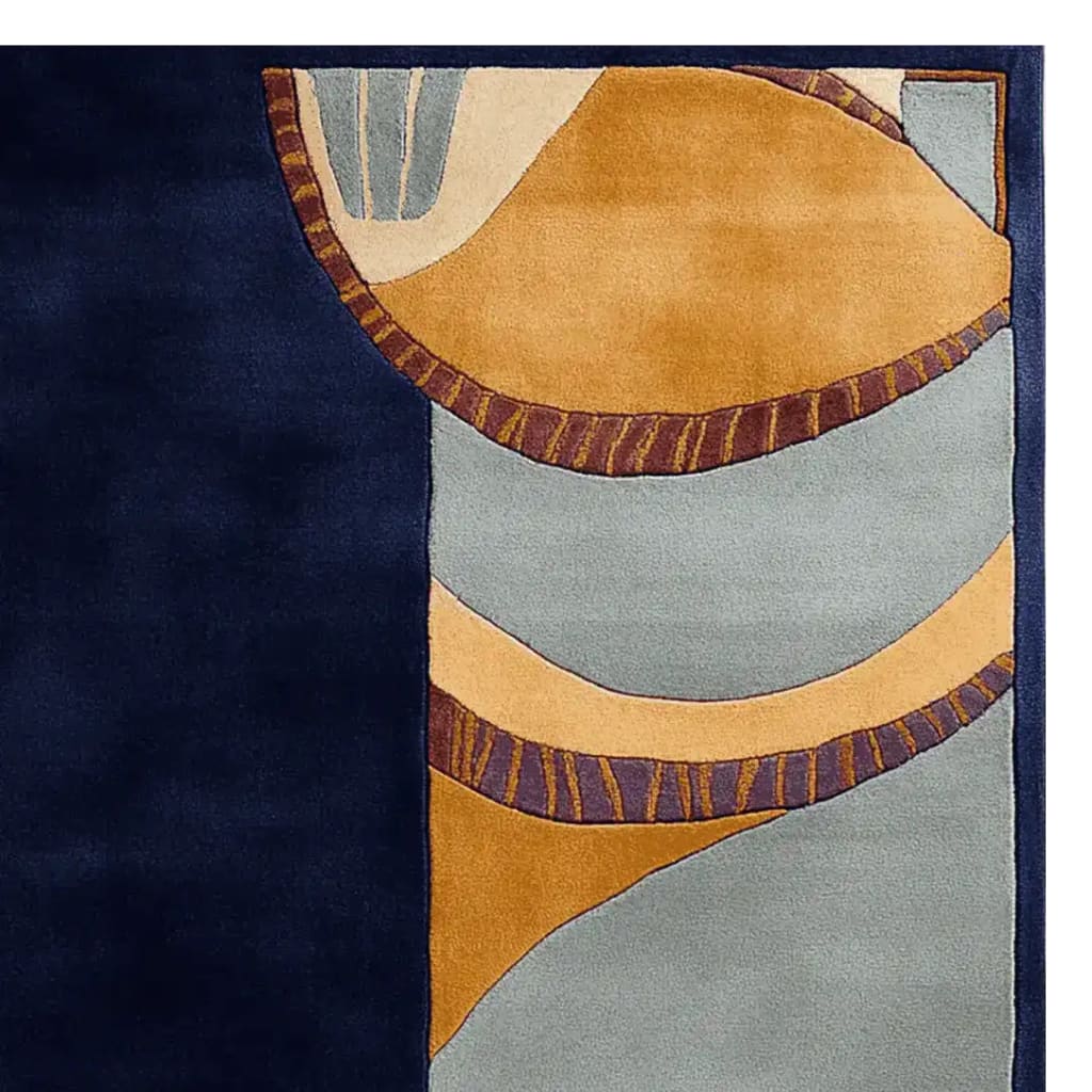 A contemporary area rug with a hand tufted design featuring abstract earth tones and patterns. The wool rug showcases a blend of navy blue, mustard, and light blue colors, perfect for adding a modern touch to living room spaces. Ideal for those seeking large living room rugs with unique artistic flair.