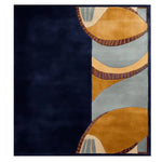 Top view of the Riverbend Earth Form Hand Tufted Rug showcasing an abstract design with deep navy and earth tones. This contemporary wool area rug is perfect for adding a stylish touch to large living rooms.